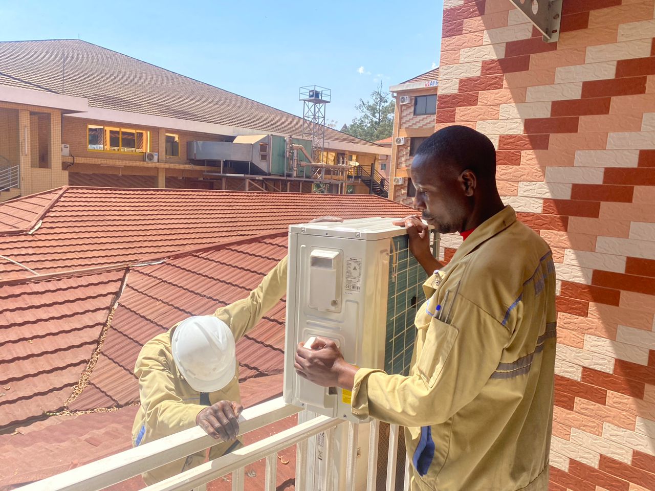 Outdoor condenser installation on a balcony